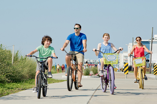 A family bikes through the Wildwoods.