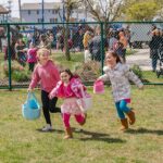 Children run during the Step Back Foundation Easter Egg Hunt