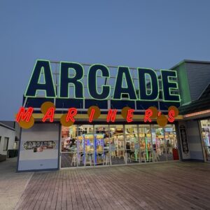 Exterior of neon Mariner’s Arcade sign on the Boardwalk